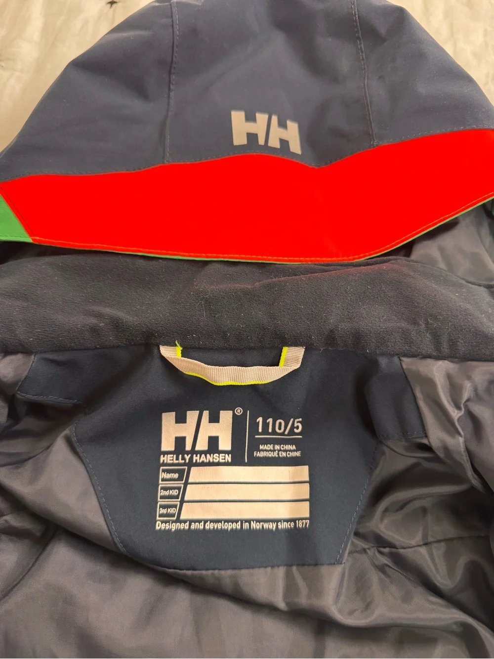 Helly Hansen Navy Jacket with Red and Green Accents